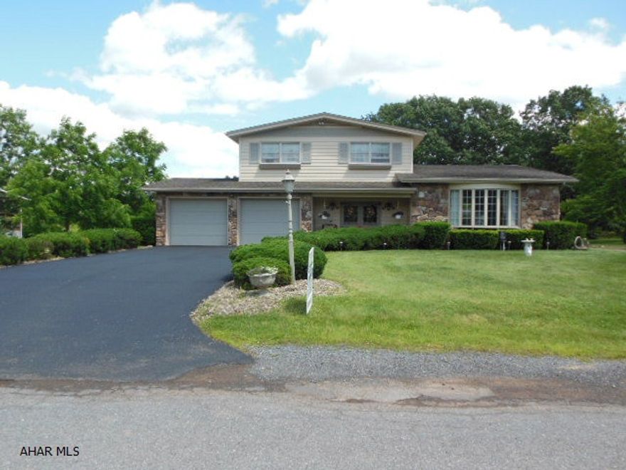 Regal Multi-Level in Logan Twp. on over 1/2 acre of ground! Appliances, 2 car garage. rec-room with FP & wet bar. Well & new public sewage just came through - not hooked into home presently. 3 bedrooms, 2.25 baths, rear covered porch with views, nice landscaping, oil hot water zoned heat with a domestic coil, wood-burning fireplace, well with softeners, granite like counter top in kitchen with built-in appliances.  Two-Car Integral garage with openers.  Nice views in front with gentle breezes. Proud neighborhood!  Freshly sealed driveway.  More pics coming soon!!