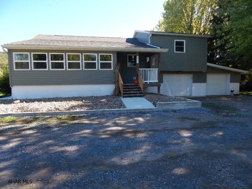 House sits on a nice open flat 0.43 acre lot with a private lane shared with only one other property. This home features new stainless steel kitchen appliances, with extended warranty. New maple cabinets. Cast iron kitchen sink. Beautiful new oak hardwood floors. Attached two car garage. Home offers 3 bedrooms, 1 full bathroom with a huge 29'x7.5' back deck, great for entertaining family and friends. This is a move in ready home! Please contact the listing agent for your private showing today.