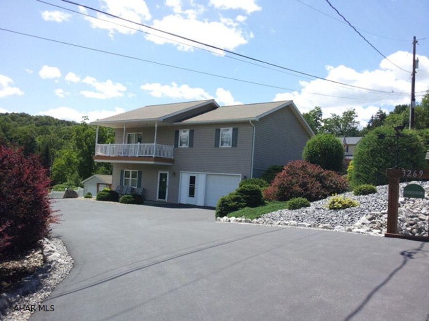 Excellent 3 bedroom raised rancher with 2 full baths. Family room with fireplace in basement. Central air conditioning. 1 car integral garage. Well manicured lot. Additional property across the street with a 2 car garage and a workshop/rec building also available. Call for details.