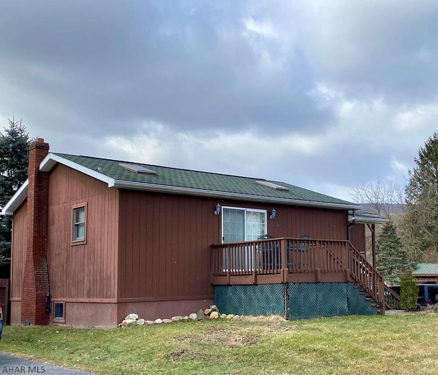 Spacious cottage close to Historic Downtown Bedford. Raised ranch with one bedroom and one full bathroom upstairs. Open-concept with a large kitchen and living room. Plenty of space to add an additional bedroom upstairs. Through the rear door enter on an enclosed three seasons room large enough for a dining table or flex space. Downstairs you will find a large finished basement with an open concept and a half bath, with a cleanout easily located to add a shower. Tons of closets, storage space and bonus rooms throughout this home can be converted to add bedrooms if needed. Or keep the grand feel of the open concept for entertaining quests for years to come.