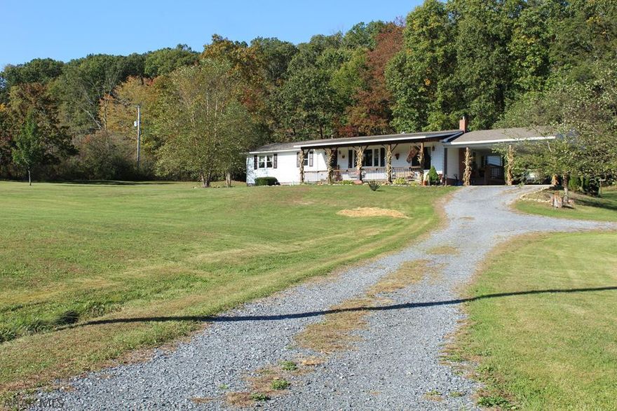 Beautiful ranch home with acreage with 3 bedrooms, 1 bath. Stainless steel appliances, all new plumbing, some new electrical work, new well pump, new pressure tank for well, newer carpet, new garage door, new windows, and new front door. Main floor laundry, partially finished basement with family room area and second kitchen. Plumbed for bathroom. Large yard, woods, and pretty views. Last home on road.