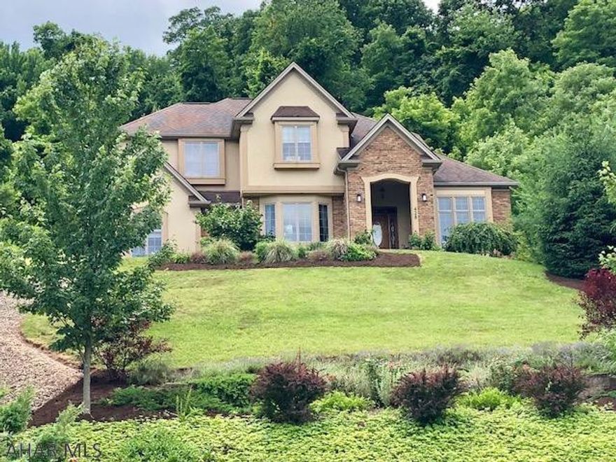 Stunning large 2 story home with over 3 acres located on a quiet cul-de-sac. This custom built home features 4 baths. Master bedroom is large with a sitting area and beautiful master bath. The second bedroom has it's own bath and the 3rd and 4th have a shared bathroom. The first floor has a formal living room, home office with built in shelves, 1/2 bath, laundry room, family room, dining room, modern kitchen and bonus room which is currently used as a play room. The basement boasts a large family room (plumbed for wet bar), fitness area and 3/4 bath. The backyard has something for all ages. There is a play area for young and old kids. Don't worry about shoveling the drive in the winter! This home comes with a heated driveway that you can control from inside the house or your cell!