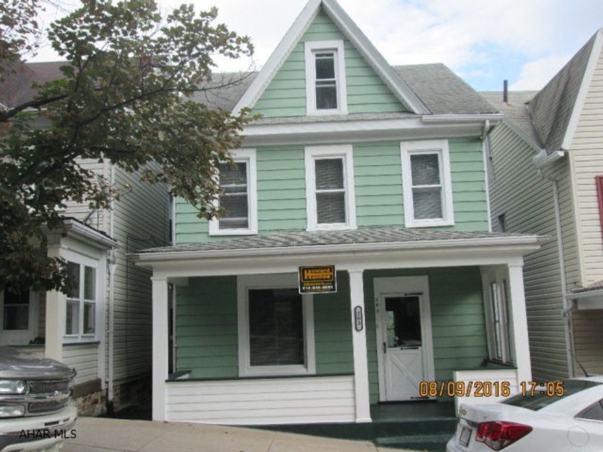 Nothing to do except move in, everything has just been done for you. This home has been freshly painted, new carpet and flooring, bathroom has been refinished and a new kitchen with appliances. Fenced in yard with brick patio on lower level and a very nice back porch area for a nice relaxing view of the city. Newer vinyl windows and nicely sided and newer sidewalks. Could have off street parking.