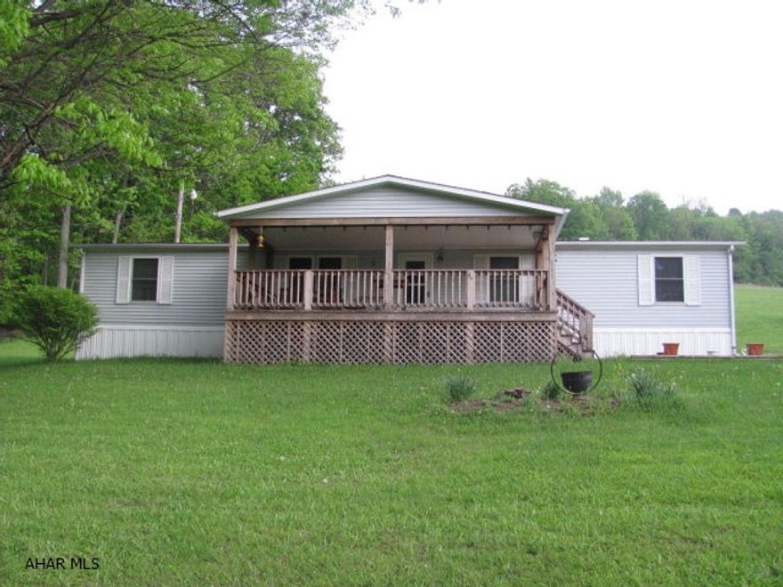 Enjoy the simple life in this 3 bedroom 2 1/2 bath doublewide on 3+ acres. Newer roof, windows and kitchen.. Great 24x24 heated 2 car detached garage. and so much more.