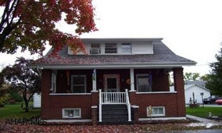 Maintenance free brick home. Highlight of the neighborhood! Spacious flat yard, huge 2 car garage. Very well taken care of home. New kitchen in 2002, new carpet throughout in 2004, new roof 2000.