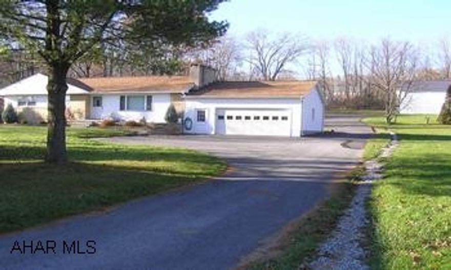 Nice Ranch Home on 1.45 acres with a 40x40 ft Garage with 12 foot doors, Heat, Electric, and Water.  Nice Location.  (Hardwood floors under carpet). Nice Ranch Home on 1.45 acres with a 40x40 ft Garage with 12 foot doors, Heat, Electric, and Water.  Nice Location.  (Hardwood floors under carpet).