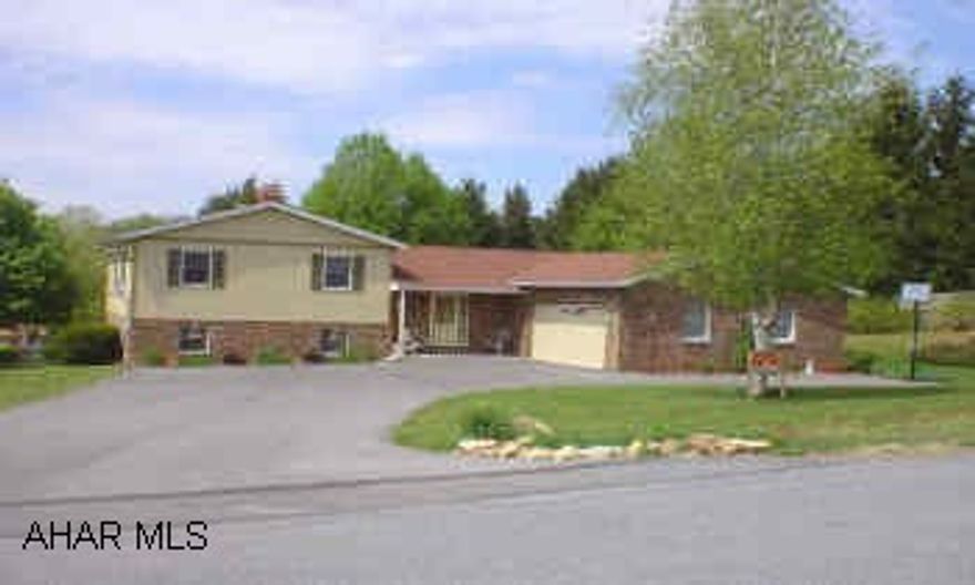 Immaculate 3 bedroom tri-level with large yard, finished basement with fireplace, totally redone, and beautifully decorated. Very meticulous sellers!