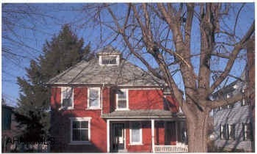 Large two story brick home in Williamsburg.  4/5 bedrooms, finished basement, full of charcter!