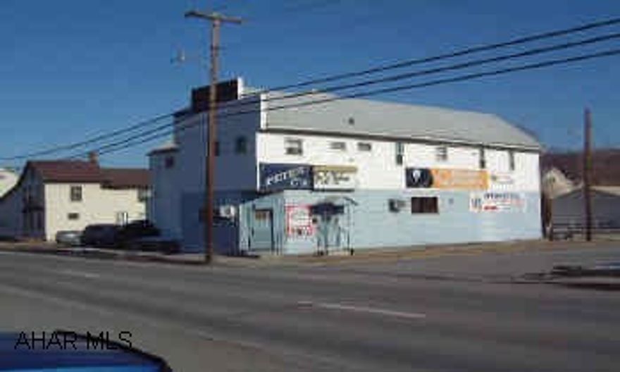 BAR/RESTAURANT WITH PA LIQUOR LICENSE AND ENTERTAINMENT. LARGE PARKING LOT.