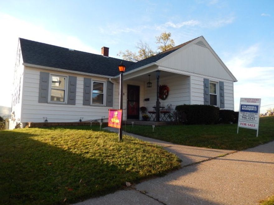 This awesome home is to move-in ready. Great location. Larger than it looks. Hard wood floors. Covered front and rear porch with a beautiful view. Kitchen includes new appliances. Newer roof and furnace. Don't miss this one!!