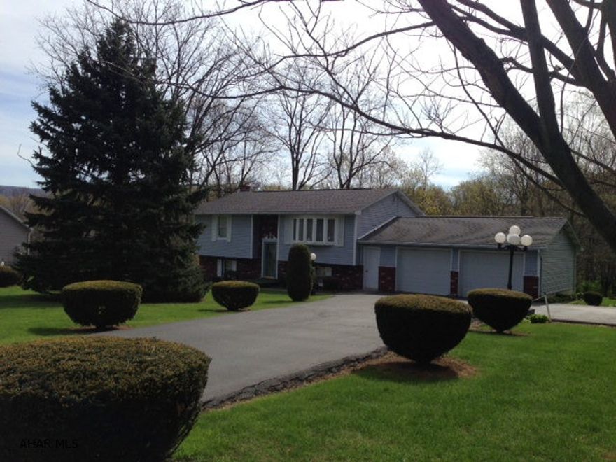 Lovely home on nearly 1 acre.  Beautiful country set, yet close to town.  2 bedrooms, 2 bathrooms.  Full, finished basement.  Storage shed included.