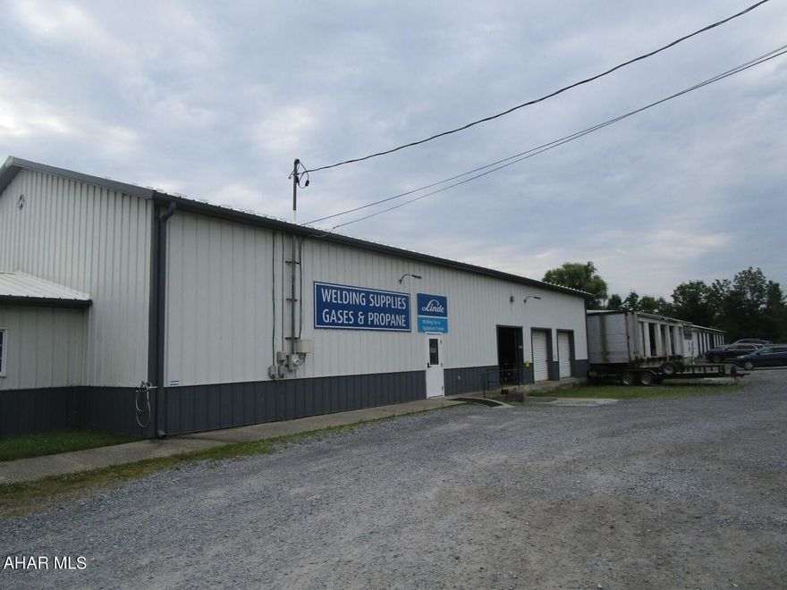 Multi-tenant facility with office space, retail, freezer storage and 2 storage trailers - all being fully leased.  Anchor Tenant #1:  Bee Line Leases approximately 7,456 sf which includes freezer space, office space, warehouse space, two storage trailers and one 10' X 20' storage unit.  Anchor Tenant #2:  Lind Gas & Equipment Center Leases approximately 5,200 sf which includes small storerooms, office space and warehouse.  Facility also includes 90 mini storage spaces which include: (43) 10' X 20' Units, (25) 10' X 10' Units and (22)   5' X 10' Units.  Owner does the plowing for the mini storage area and most of the maintenance for the mini storage area.  Mini Storage Units and rear warehouse building are not heated.  Other warehouse areas may also not be heated.  Good solid anchor tenants with a lot of time remaining on leases.  Great annual income with minimal expenses. Proper disclosures will need signed before disclosing income.   Showing times between 9:00 AM to 4:00 PM Monday thru Friday.  Buyer and buyer's agent to confirm square footage.