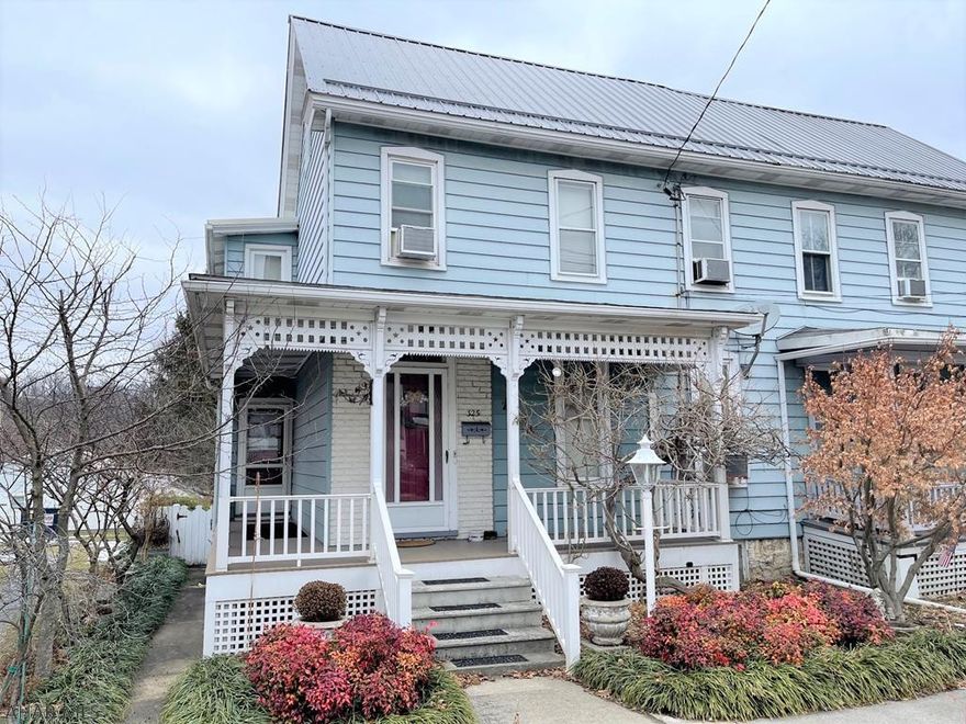 Super charming one-half double in historic Bedford Borough!! 1st level offers a sizeable LR w/ wood fireplace & open staircase, DR w/ glass french doors, kit w/ island, & a sun room w/ direct deck access. 2nd level has 3-bedrooms, a full bath, & an office. Large walk-up attic that could be finished into a loft or additional living area. Full partially finished bsmt w/ a half bathroom, workshop & ground level walk-out. Covered front porch, rear deck, & concrete patio. Updated metal roof, replacement windows, & maintenance free porch decking. "Bosch" natural gas furnace w/ two zones, 200-ampere electric, & gas water heater. 2-car detached garage, black top driveway, & a well landscaped lot. Great location just blocks from the downtown area, restaurants, & shops!!