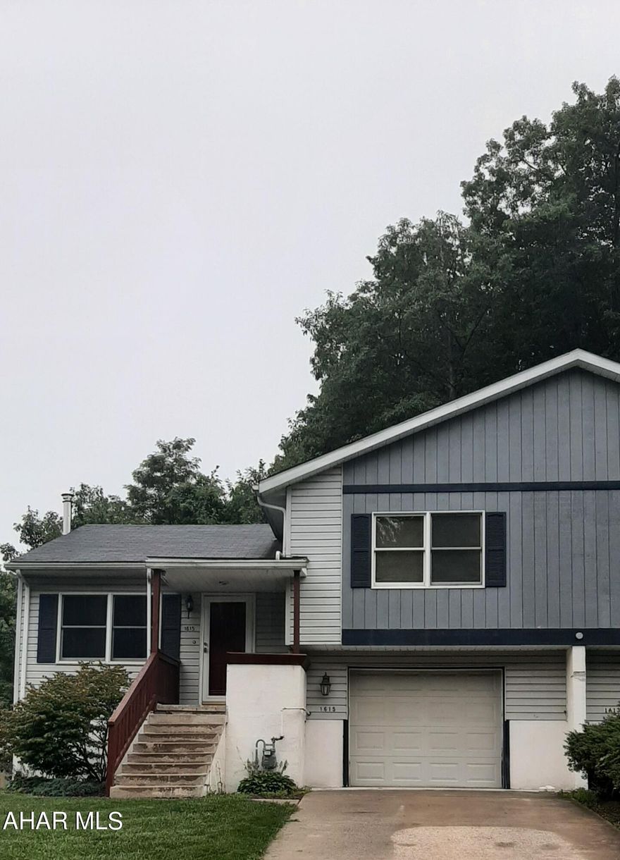 Half of Duplex in Logan Twp.... Main level has large eat in kitchen w/ garden window and newer appliances, den/ formal dining room leading to back deck, living room with laminate flooring. 2nd level has 2 bedrooms with large closets a full bath with a sky light. Lower level has family room, bonus room and a bedroom all with carpeting plus a flu for a wood burner or pellet stove. 1 car garage , utility room with 1/2 bath  Some other feature this home has to offer  are central air and electric baseboard heat. Set up a showing today. Listed for $120,000