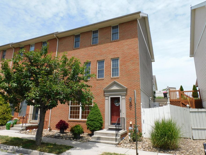 Beautiful Townhouse in Hollidaysburg!  Kitchen features tile floor, breakfast bar, and plenty of cabinets. Formal dinning room that walks you out to delightful yard with a deck. Spacious living room that gives you an open floor plan to the dinning room. Primary bedroom has a walk-in closet. Finished lower level with a family room and 3/4 bath. New roof in 2024. New Furnace and AC in 2023. Tastefully landscaped and a detached garage. 3 levels of living area will make this house great for an entire family. All of this in the Hollidaysburg School District! Extremely well-maintained and ready for a new owner.