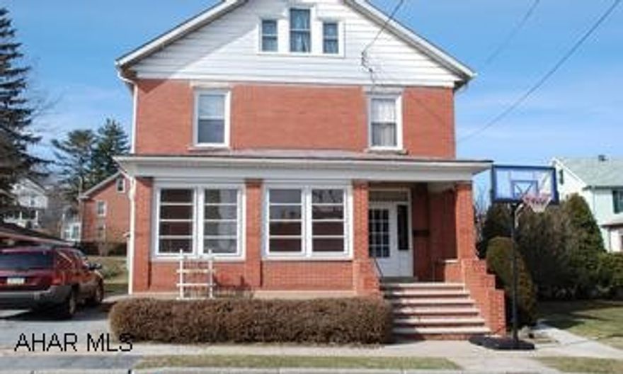 2 1/2 Story Brick Pocket doors, french doors, oak trim.