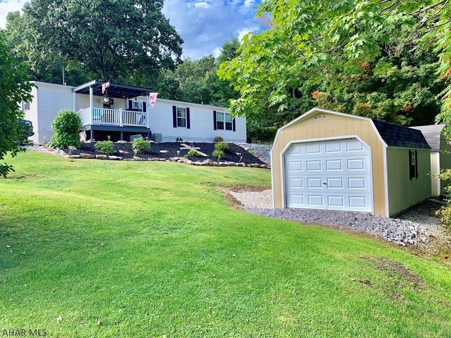 Well maintained move in ready double-wide home built in 2014. This home offers 3 bedrooms, 2 baths, living room and family room, open floor plan, large kitchen with hickory cabinets, insulated windows, kitchen appliances, two sheds, and much more. Located not far from Lake Raystown. Call today to setup a showing!