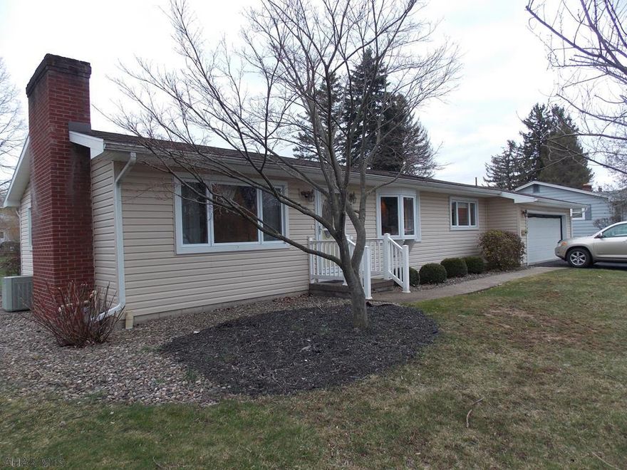 This home is PERFECT for those who want to downsize.  Perfect open floor plan where the updated kitchen opens to the DR/LR with a view of the fireplace.  The kitchen is updated with tons of cabinets and counter space and ceramic tile floors.  In the LR/DR area you will find oak laminate floors and the gas fireplace.  The DR has a bay window and the kitchen and LR have large picture windows bringing in lots of sunlight.  The 2 car garage walks right into the kitchen which make unloading or loading the car a breeze.  Newer windows, roof, soffit, spouting, siding and furnace are added benefits to the PERFECT house.  Call today to see this home it may be the PERFECT home for you, don't wait - won't last long!