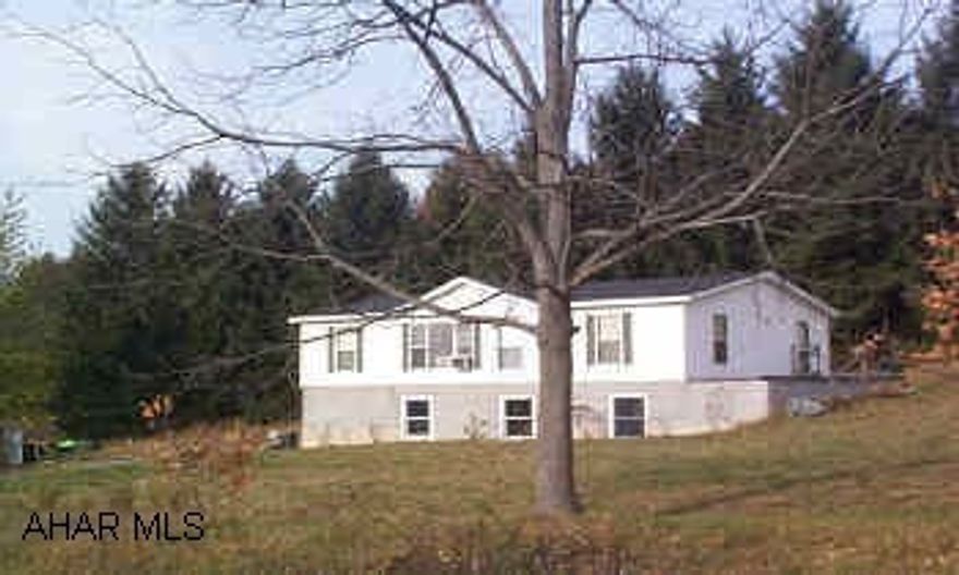 2 yr old doublewide in Logan twship on full foundation-easily finished.