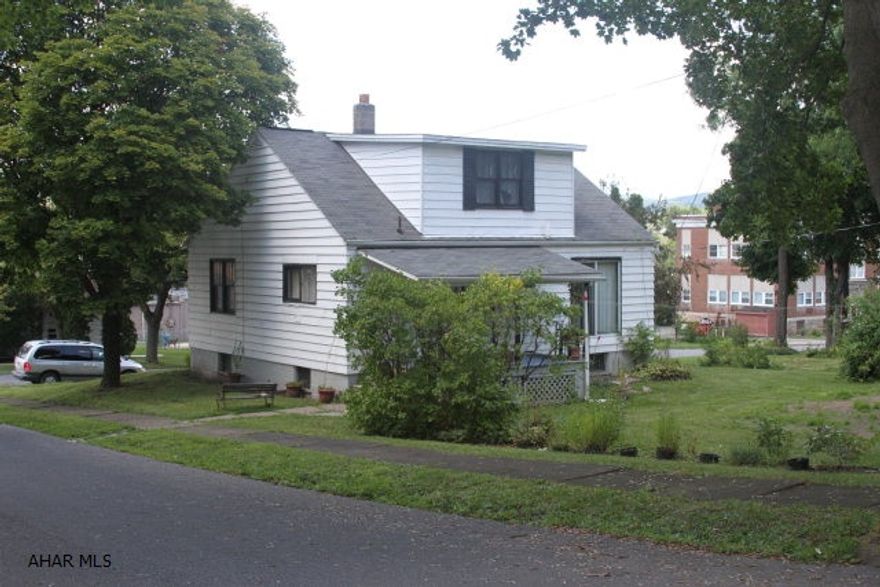 Lots of opportunity - 2 vacant lots go with this property for lots of space in the city.  Close to local amenities and Highland Park.  This property needs a rehabilitation inside and out so you can put your personal touch on it.  Agent is related to the Executor of the Estate