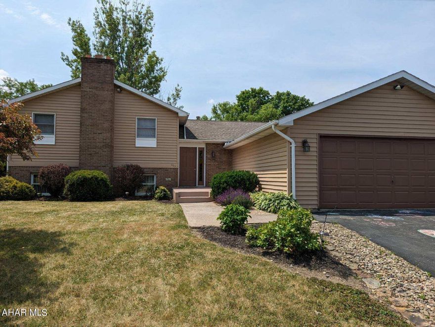 Say ''HELLO'' to your new home in Penn Farms --  Landscaped and move in ready. Simply unpack the enjoy!   Great place to raise your family - so spacious!  This home offers 4BR, 3 BA, not to mention a nice family room in the lower level w/Brick fireplace. Enjoy the outside with the covered deck AND Patio that leads to the nice level (partially fenced) yard.  Ready to make some new memories?!................