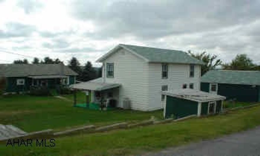 DCozy 2BR home on over half acre of ground. 2 car garage. New roof, thermo windows.