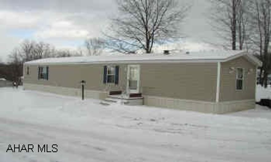 VERY NICE 14X72 CHAMPION SINGLEWIDE.  NEW DECK, NEW SPOUTING.  LOT RENT $240.  PRICED TO SELL.