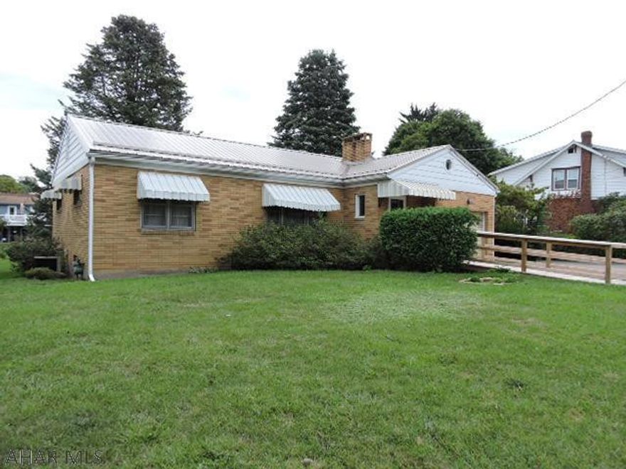 Good opportunity to make this one yours.  Sweet brick rancher in need of TLC.  Nice rear patio, large living room with fireplace.  Ceramic tile bath.  Basement could be finished, needs work.