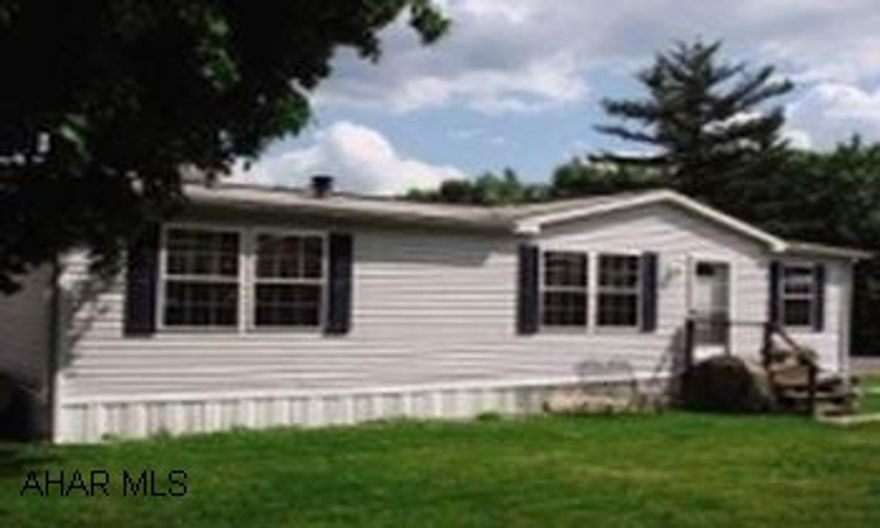 Champion doublewide on rented lot. Lot rent #180.00 month, home is 44' X 27' very clean, shed, 3 bedrooms, living room, dining room, 2 baths.
