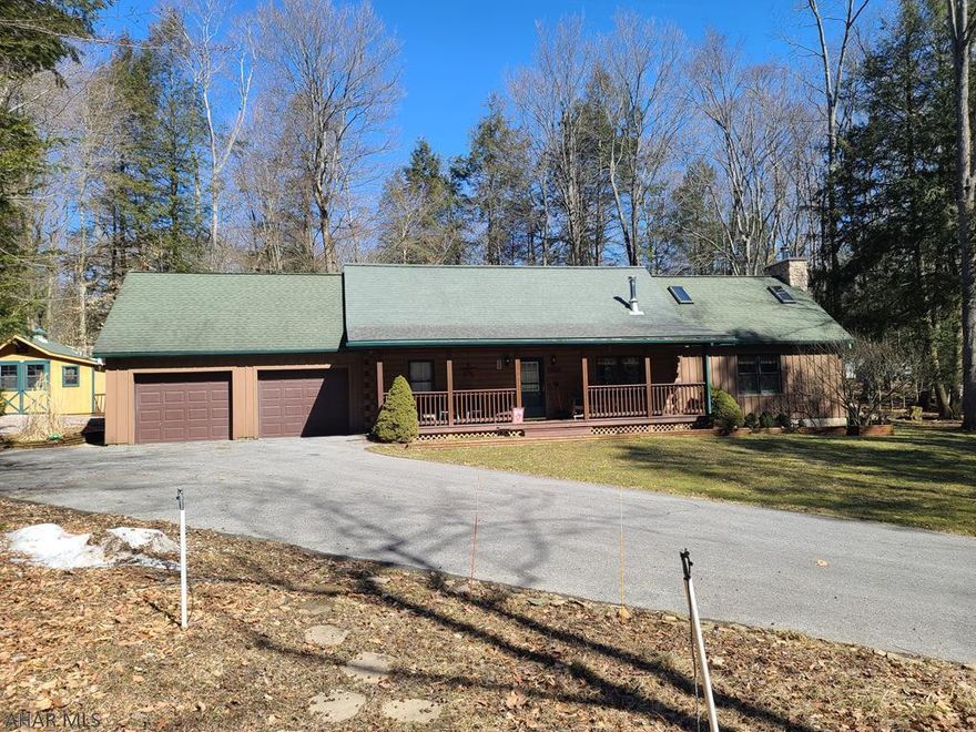 Beautiful cabin in the woods! 4 bedrooms and 2 bathrooms with 2 car garage located in Glendale Yearound. Plenty of room for family and friends. This home can be a full time residence or your weekend getaway. Back yard has a small pond and is mostly fenced. Paved driveway keeps you out of the mud. New refrigerator, washer, and dishwasher! New luxury vinyl flooring and some new carpet. There is also a shed included. Glendale Yearound is a gated community located minutes from Glendale Lake and Prince Gallitzin State Park. Community pool, tennis, basketball, and more.