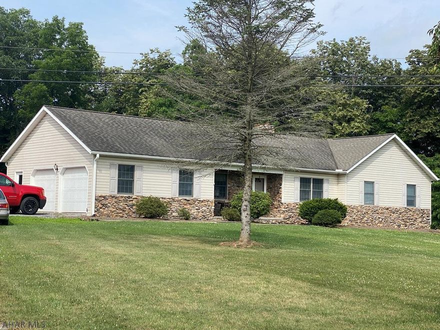 This Stone and vinyl sided 4 bedroom 2 full bath ranch home in Juniata Mills Development is situated on 1.3 acres close to all amenities. master bedroom with garden tub and walk in closet, large patio with a private back yard. Oak Kitchen with new stainless steel appliances, beautiful stone fireplace, large living room, hardwood floors, first floor laundry, full finished basement with a wood stove.