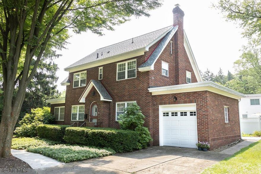 Classic traditional elegance. Beautiful brick home - immaculately maintained. Updated kitchen with stone counters, crown moldings, and a huge yard. Quiet cul-de-sac. Central air on first floor.