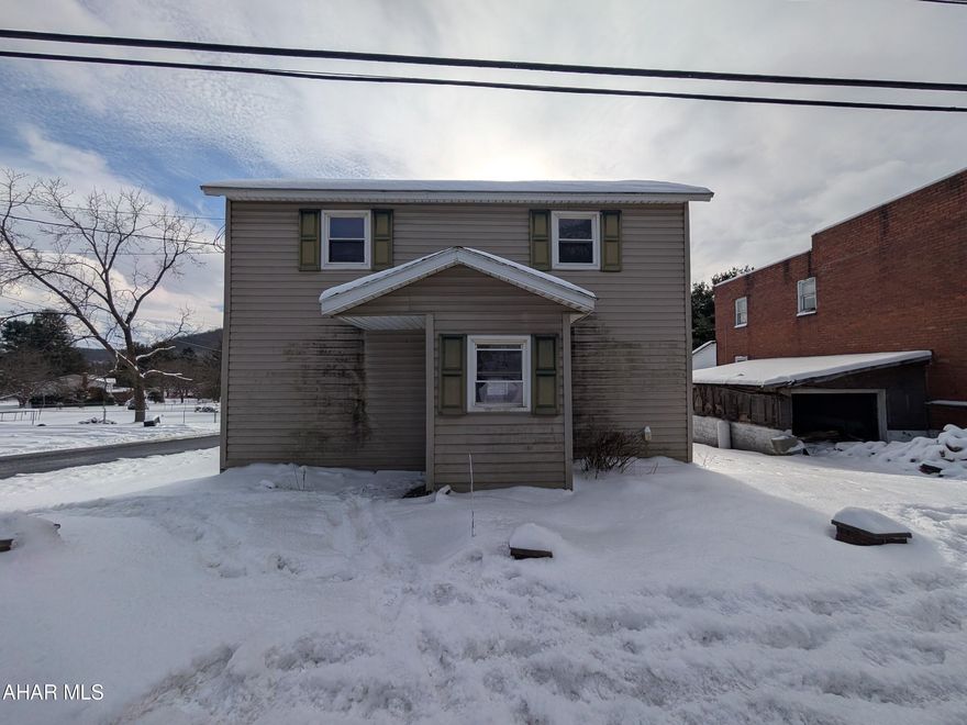Northern Cambria 2 story vinyl home. Living room w/ ornamental FP, formal dining. Perfect for investors or handypersons! AS-IS sale, seller will make no repairs. Buyer to pay any required municipal sewer testing and/or repair escrow.