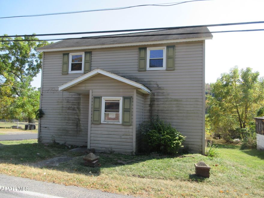 Northern Cambria 2 story vinyl home. Living room w/ ornamental FP, formal dining. Perfect for investors or handypersons! AS-IS sale, seller will make no repairs. Buyer to pay any required municipal sewer testing and/or repair escrow.