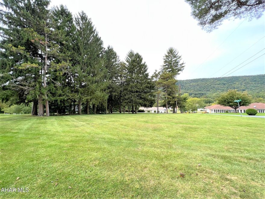 This is the perfect building site for that new home!! Containing a .45 acre lot, access to public water, public sewer, and electric. Very gently sloping topography and public road frontage. Convenient location to supporting amenities and major roads. Buyer to verify all utilities and information.
