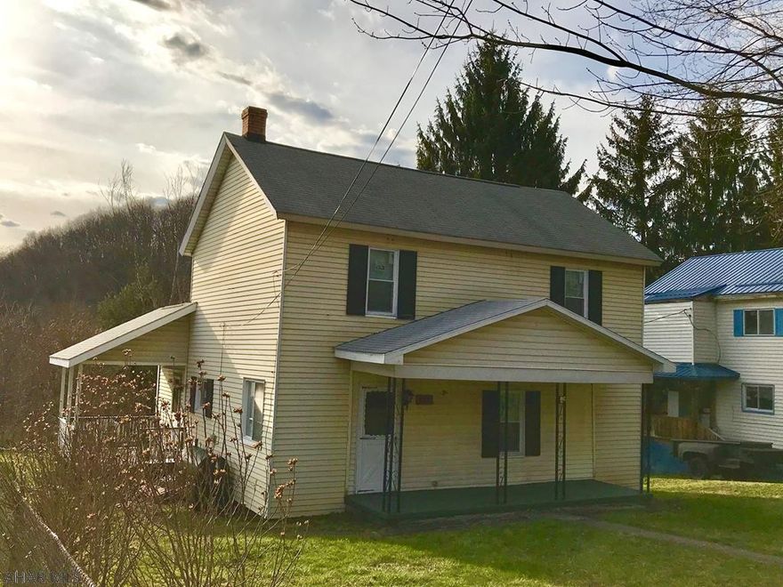 2 story home on a nice lot. Located between Lilly and Portage. This home features 3 bedrooms 1st floor laundry, new 200 amp service and water heater both just installed. Lot has recently been surveyed.  There is so much potential to make this your dream home.