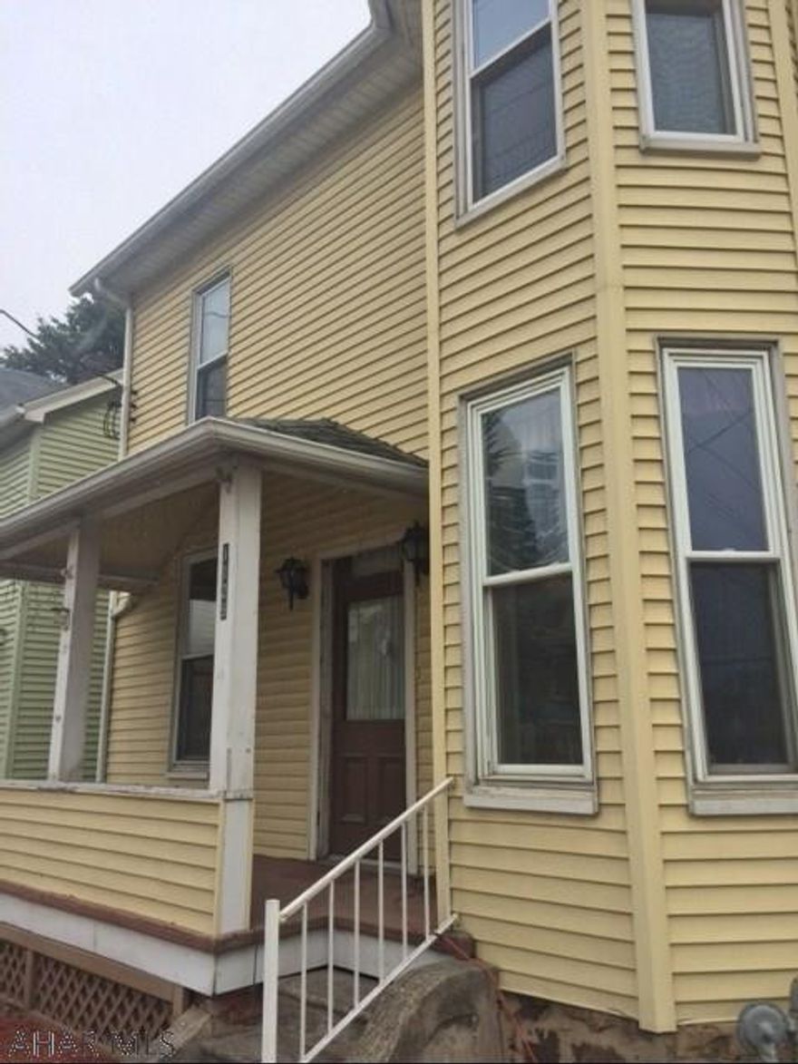 HANDYMAN, INVESTOR or Small Business Owner.  Large charming Victorian with 4-5 bedrooms and 2 full baths.  Could be Commercial with good exposure on Rt 22 in the Antique district,  and/or large Residential family home in Hollidaysburg Schools.  Also very easy to duplex.  Newer siding and roof and central air to 1st floor.  2 car detached garage and small parking lot.  Easy access and good exposure in the Antique district! Extensive freeze damage to heating and plumbing systems.  Structure very good.  AS IS-Cash.