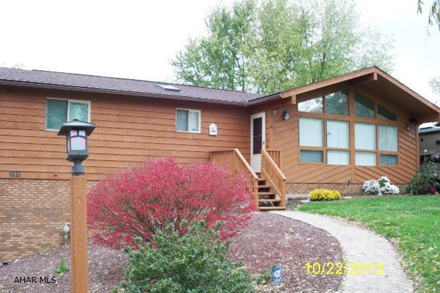 Great one story cedar home in a quiet neighborhood.  Home is very bright with lots of natural light because of the large windows and skylights. The cathedral ceilings and wood fireplace only lend to the coziness of this  home. Large Master Bedroom with walk out to deck. Master also has a walk in closet, beautiful master bath with jetted tub and double  bowl sinks. There is even an area for an office if you so wish.  Heat pump is 5 years old but a new furnace was installed in 2014. Worried about high cost of electric heat? Don't be. Heat pump kicks off when temperature reaches 32 degrees and gas kicks in. New windows installed in living room & master bath May 2014. This home is on a large lot and offers a 4 car garage plus driveways on both sides of the property!!