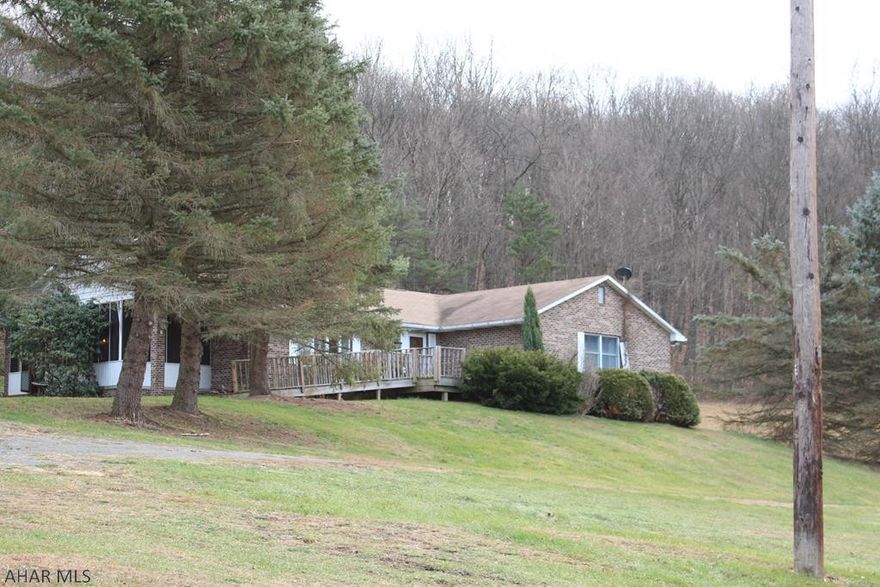 This property truly has it all and more! 3 open fields combined to make 18 tillable acres, plenty of wooded acreage for hunting, a 2 large ponds for fishing and 2 home sites. Spacious 4 bedroom, handicap accessible, brick ranch home with 2 full baths,  bath in basement, a finished rec room with bar and a full stone wall with fireplace made from river rock from the Potomac River. The farmhouse is a 3-4 bedroom home featuring a great room with vaulted ceiling and stone fireplace. With a little TLC it could become a great place for guests or rent it out for some extra income. Tons of potential with this property, call today for your own private showing!