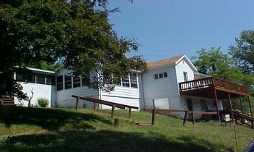 Home can be used for year-round living or family retreat.  Property is approximately 300 feet from Juniata River, but not in a flood plain.  Located in a quiet family community that is close to State Game Lands. Route 26 North to W. Cypher Rd. before Kountry Kettle Restaurant.  Follow W. Cypher Rd. for 1.5 miles to stop sign.  Go right for 1.5 miles to Locust Beach on right.  Property inside Locust Beach Community.  Home can be used for year-round living or family retreat.  Property is approximately 300 feet from Juniata River, but not in a flood plain.  Located in a quiet family community that is close to State Game Lands.