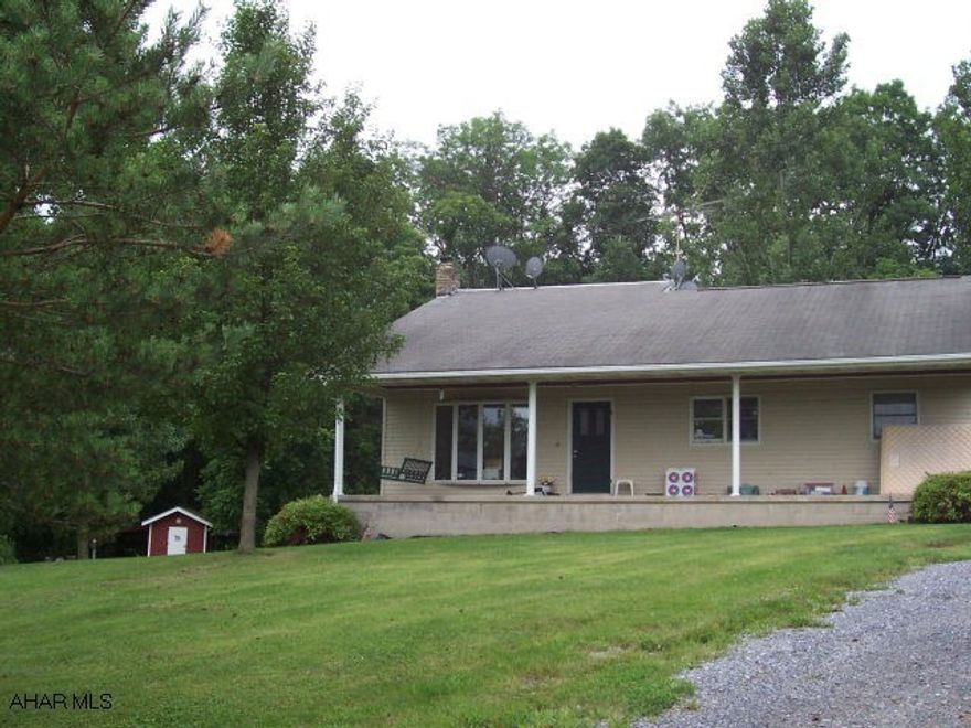 Very private setting, Horse Lover's Dream!  1 1/2 story home, situated on 10.2 acres, mountain views. Stall barn, borders state gamelands.  Secluded 1 1/2 story home on 10.2 acres, fantastic views, Pine wood floors throughout, above ground pool, pavillion, screened in porch, 1 stall barn, borders state game lands.