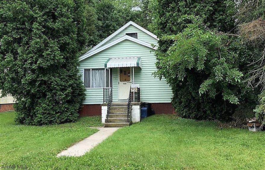 Great potential in this 2-3 bedroom, 1 bath home.  Open floor plan.  Private back yard with mature trees.  Flood Insurance to be less that $500.00/year.