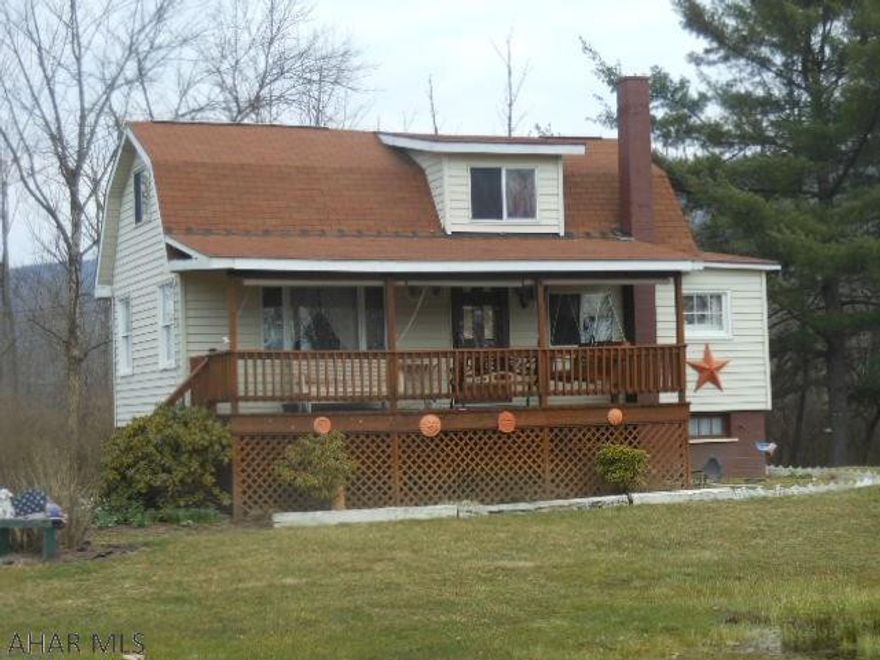 Cozy home & well maintained on 8.6 acres. Relaxing front porch, eat-in-kitchen, large main floor bath. UV light on well, taxes going to appeal. Small brick building, no heat and no running water. House sits on 60x132 parcel (008)