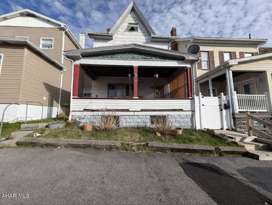 Investor special in the East End of Altoona. Spacious 3-bedroom, 1.5-bath home offering approximately 1,700+ square feet with original woodwork, hardwood floors, and a detached garage. Property needs renovation and is being sold as-is, presenting a strong opportunity for investors or handy buyers looking to add value. Convenient location near downtown, schools, and major routes. Priced to sell.