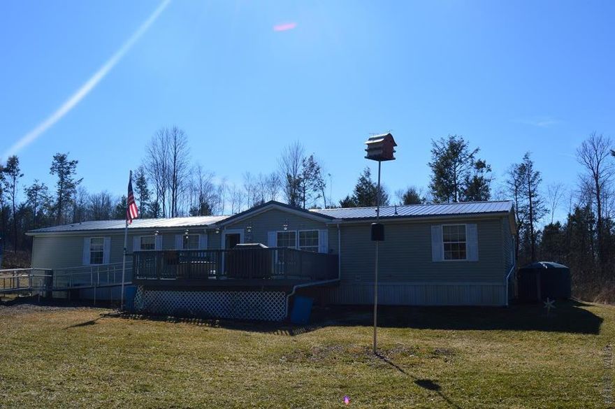 A scenic landscape surrounds this 4 bedroom, 2 full bath 1 story home.This picture perfect, private estate boasts 5.6 acres. Located only a few minutes from Prince Gallitzin State Park. The owner has taken great pride in the property and has made over a dozen updates including a new heat pump system, 45 year metal roof, workshop/shed, Pella Door & a Organic Green House  (contact agent for full list and details). Don't miss this opportunity to live in the country but close to local conveniences.