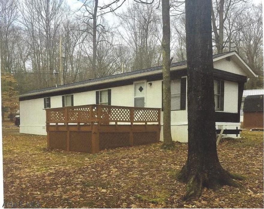 Nice clean mobile home on 2 lots, deeded as one. New carpet, vinyl and painted, new roof & front door in 2018. Furniture and appliances included. Many upgrades Also air conditioning