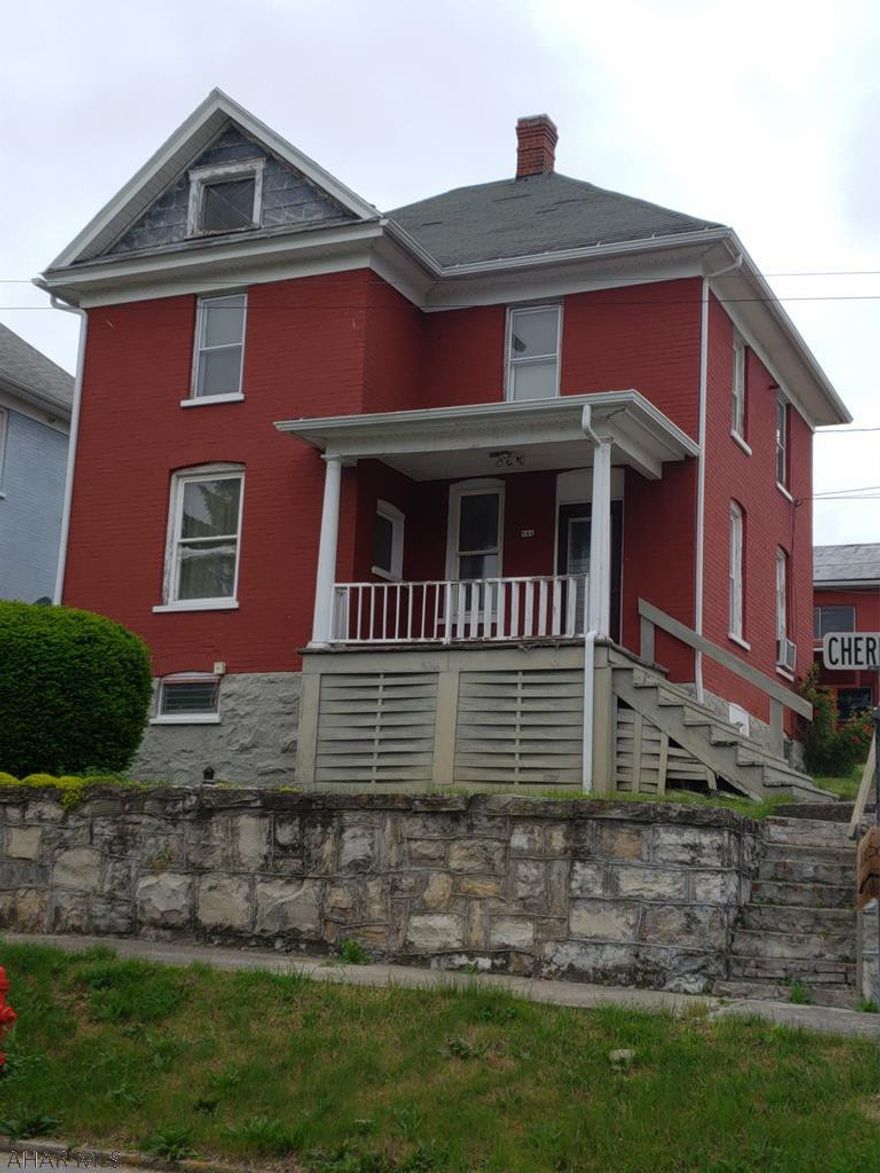 Very nice home in the heart of Roaring Spring.  This brick home, situated on a corner lot features 3 bedrooms, 1.5 baths, a detached "mechanics garage" complete with an oil furnace.  Additional features include newer windows, a semi-finished basement, and a nice backyard.  Each room has wall-to-wall carpeting, and most of the rooms have ceiling fans.  The kitchen appliances, along with the dryer are included in the sale.  Priced to sell at $50,000.  Call the listing agent today to schedule your private showing!