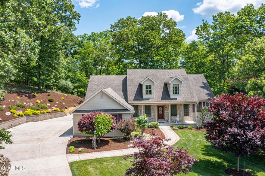 Welcome to your future home in the sought-after Fox Hollow Development, where this spacious 5-bedroom, 2.5-bathroom residence awaits. Located on the largest lot at the end of a peaceful cul-de-sac, this property combines luxury and practicality, making it perfect for any family.

As you step inside, you'll immediately notice the abundance of natural light streaming through the numerous windows, enhancing the bright and welcoming atmosphere. The living room features soaring high ceilings, creating an expansive and open feel ideal for both relaxing with family and entertaining guests.

The heart of the home is the well-appointed kitchen, designed for efficiency and ease with ample counter space and modern appliances. Adjacent to the kitchen is a versatile breakfast area that seamlessly flows into the living room.

The first-floor primary suite is conveniently situated off the living room, offering a private and tranquil retreat. This suite features spacious closets and a well-designed bathroom, providing a comfortable and private space.

Upstairs, you'll find three additional generously sized bedrooms and one full bathroom, providing plenty of room for family members or guests.

One of the standout features of this property is the 1,900 sq. ft. unfinished walk-out basement. This wide-open space is a blank canvas, ready for you to customize into a home theater, gym, additional living quarters, or whatever suits your lifestyle.

Parking will never be an issue with an attached 3-car garage and an additional 2-car detached garage, perfect for extra vehicles, storage, or a workshop.

The home's exterior is equally impressive with its beautiful curb appeal and meticulously maintained landscaping. The large private lot offers a serene and tranquil setting while still being conveniently close to local amenities, shopping, dining, and schools.

This well-maintained home in Fox Hollow Development is a rare find, combining luxury living with a practical layout. Schedule a private tour today and envision your future in this exceptional property.

Additional Features: 
1st floor living
Private Deck (freshly painted) 
Sink in basement
Alarm system
Security cameras
Radon System 
Detached Garage has Electric heat and Ac through unit.