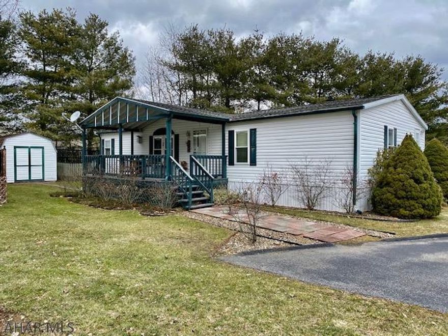 Convenient one-story living! Located in Independence Park, a 55+ living community.  Move-in ready!   This 3 bedroom/ 2 bathroom home offers vaulted ceilings throughout, a gas fireplace in the Living room, and an island in the kitchen, which is open to the dining area. Wonderful floor plan with an office nook located off the kitchen.  Spacious master bedroom and bath with his and her sinks and walk-in shower. New windows were installed throughout in 2020. Central air. Covered front porch perfect or relaxing! For extra storage, there are 2 sheds included with this home.  There is also a fenced garden area. Call to schedule your showing today!