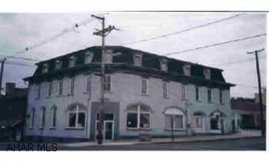 Building previously used as a Bank w/apartments upstairs. (currently vacant) Historic District. Feasbility study available. J-455 Building previously used as a Bank w/apartments upstairs. (currently vacant) Historic District. Feasbility study available. J-455